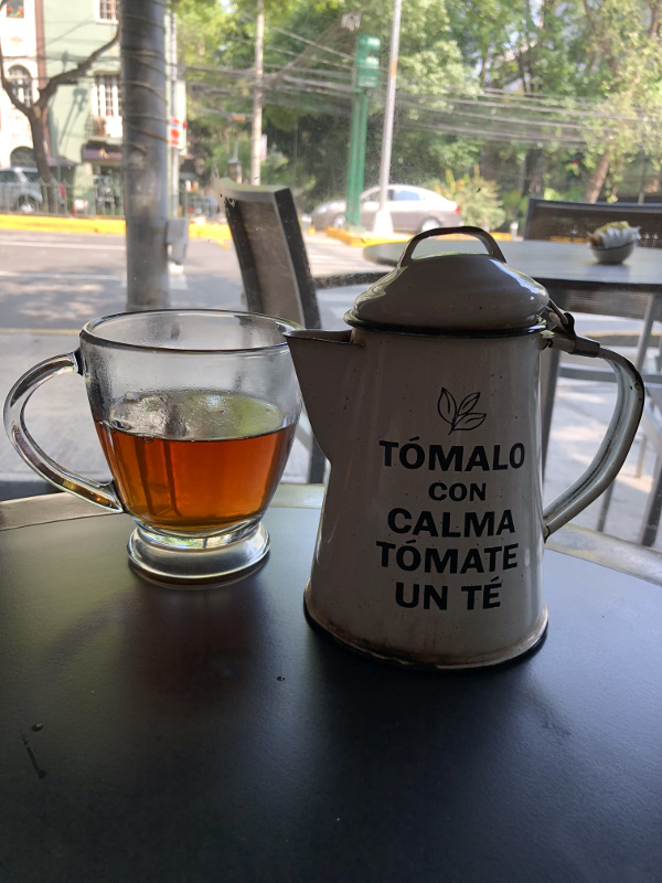 esquina de té, taza con tetera